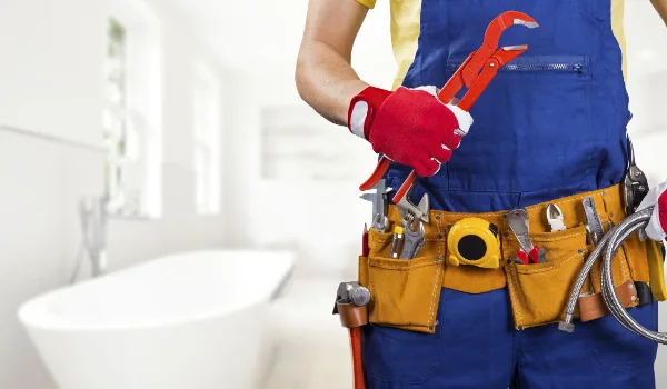 The torso of plumbing technician showing a tool belt from Plumber Pflugerville in Georgetown, TX - Georgetown TX The torso of plumbing technician showing a tool belt from Plumber Pflugerville in Georgetown, TX - Georgetown TX